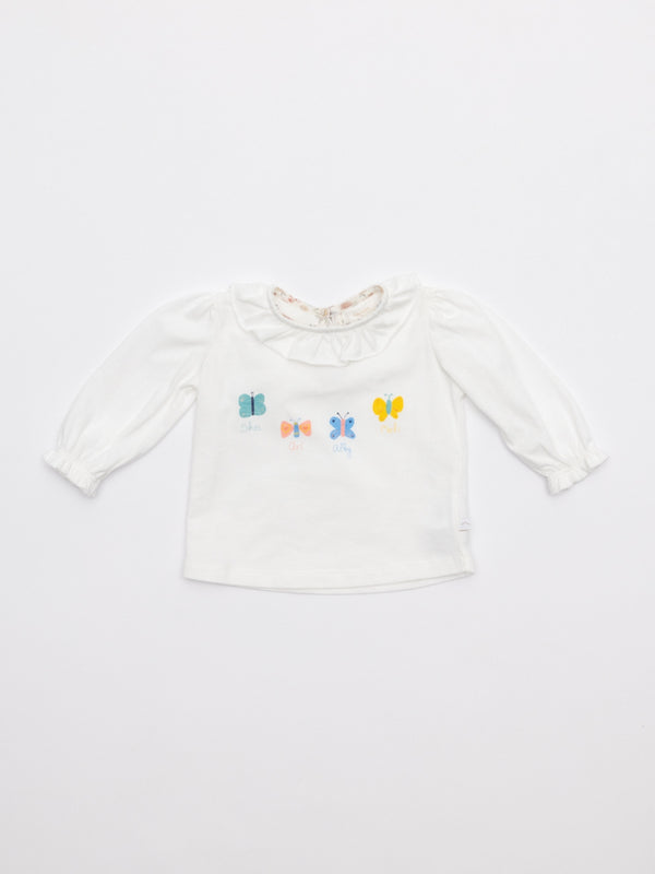 Camiseta cuello volante mariposas piping Liberty nata