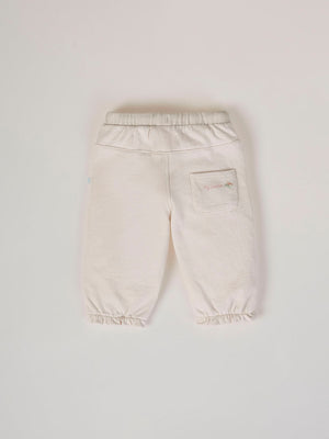 PLUSH PANTS WITH BEIGE RUFFLES AND ELASTIC PANTS