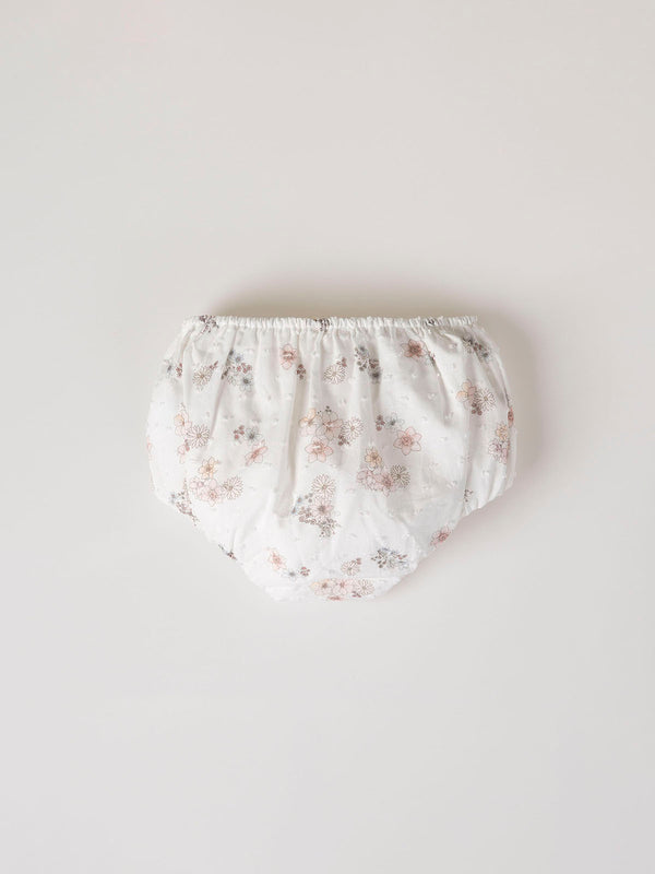 FLOWER PRINTED ROMPER WITH CREAM BOW