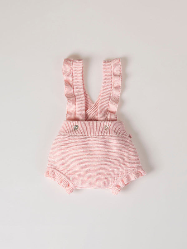ROMPER WITH KNITTED STRAPS AND RUFFLES WITH PINK LINKS