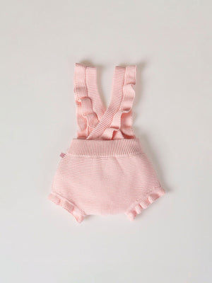 ROMPER WITH KNITTED STRAPS AND RUFFLES WITH PINK LINKS