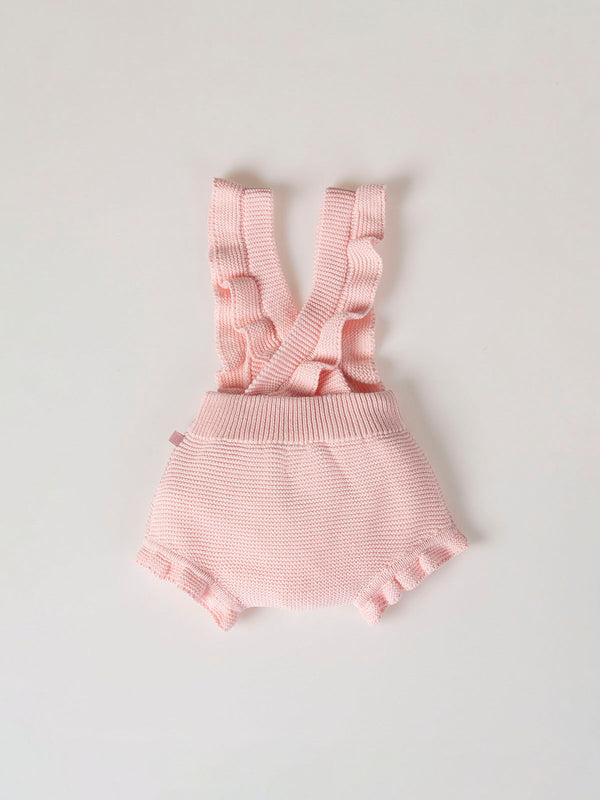 ROMPER WITH KNITTED STRAPS AND RUFFLES WITH PINK LINKS