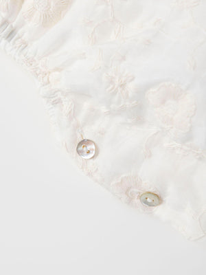 MAMELUCO SEDA BORDADA MAXI CUELLO MARFIL