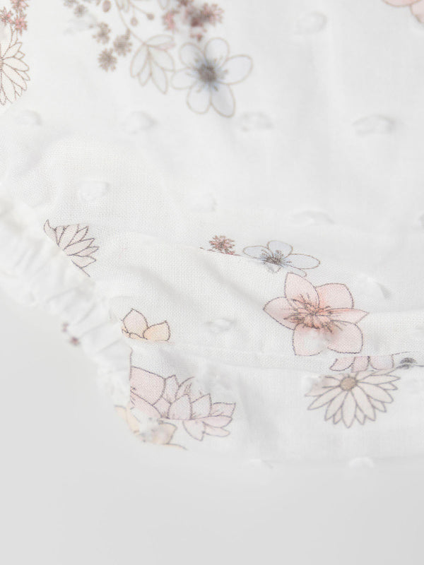 FLOWER PRINTED ROMPER WITH CREAM BOW