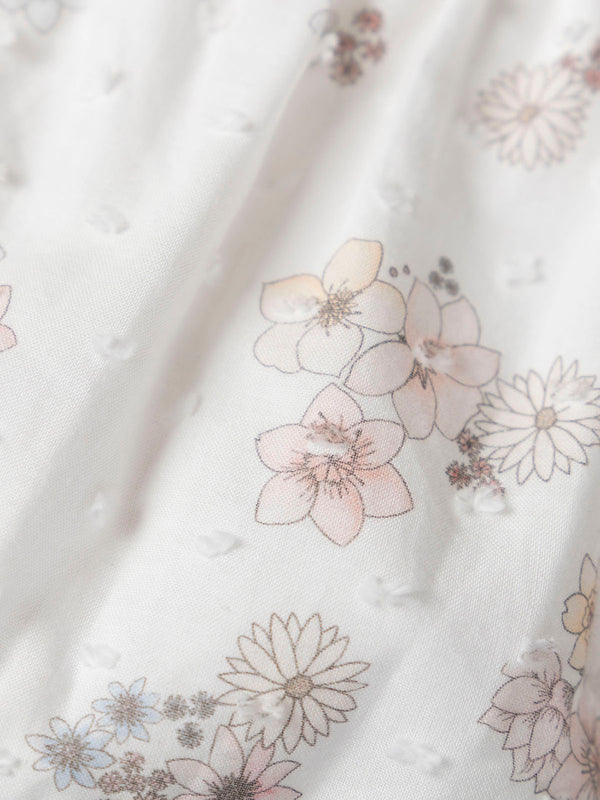 FLOWER PRINTED ROMPER WITH CREAM BOW