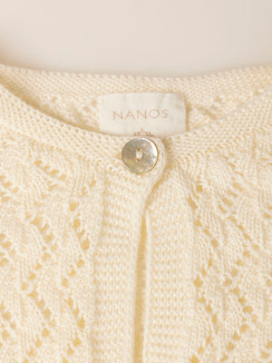KNITTED JACKET WITH IVORY OPENWORK BUTTON