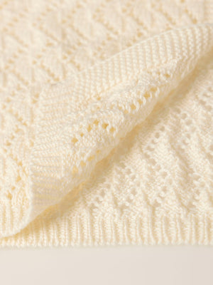 KNITTED JACKET WITH IVORY OPENWORK BUTTON