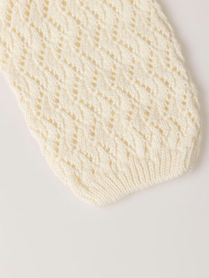 KNITTED JACKET WITH IVORY OPENWORK BUTTON