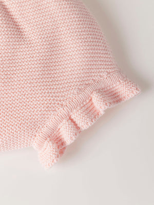 ROMPER WITH KNITTED STRAPS AND RUFFLES WITH PINK LINKS