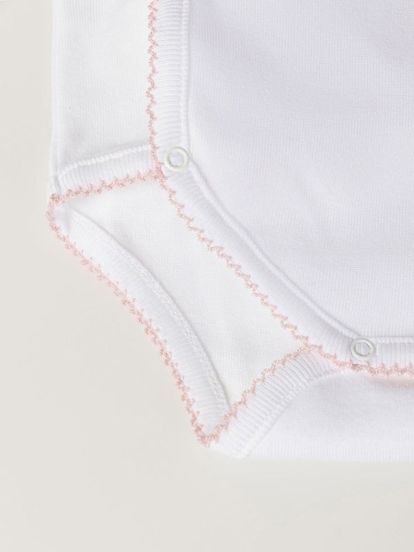 PINK CROSSED LONG SLEEVE BODYSUIT