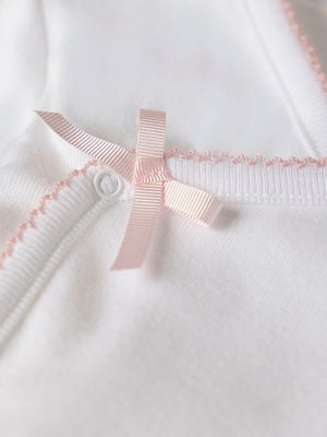 PINK CROSSED LONG SLEEVE BODYSUIT