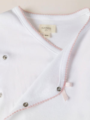 PINK CROSSED LONG SLEEVE BODYSUIT