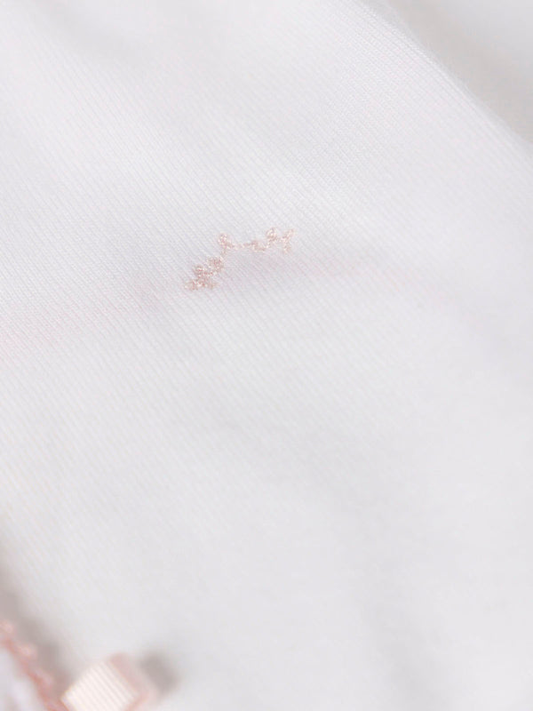 PINK CROSSED LONG SLEEVE BODYSUIT