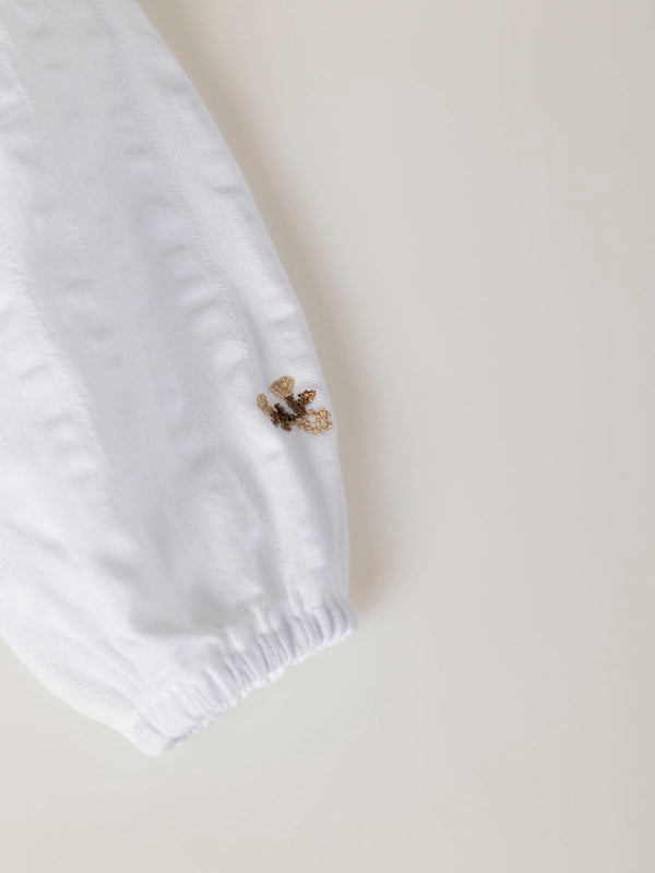 MAMELUCO ESTRUCTURA CUELLO PLUMETI MARFIL