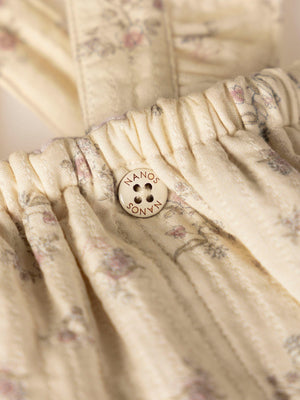CREAM FLOWER PRINT ROMPER WITH STRAPS
