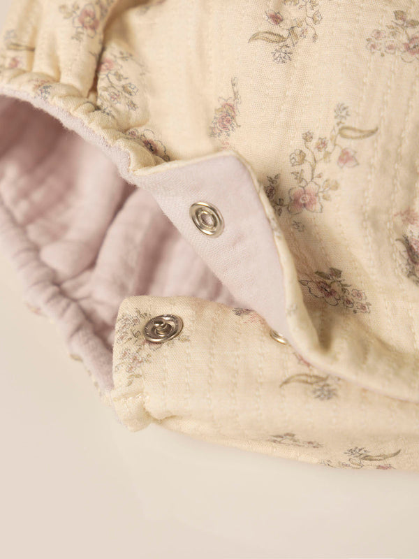 CREAM FLOWER PRINT ROMPER WITH STRAPS
