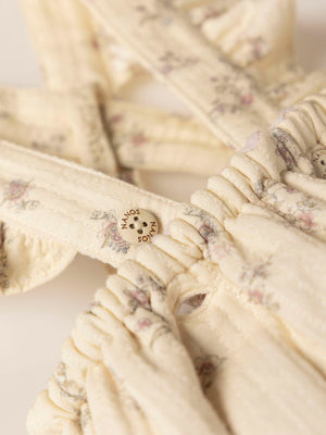 CREAM FLOWER PRINT ROMPER WITH STRAPS