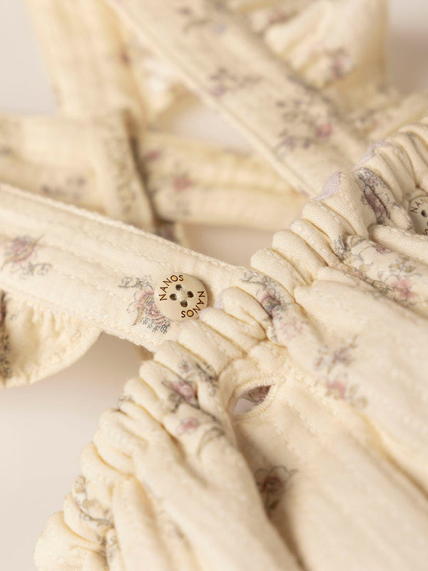 CREAM FLOWER PRINT ROMPER WITH STRAPS