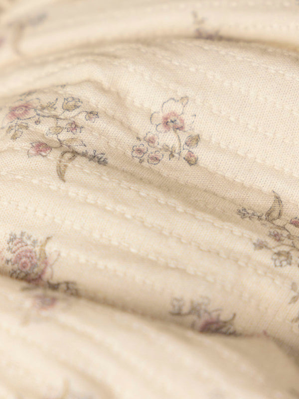 CREAM FLOWER PRINT ROMPER WITH STRAPS