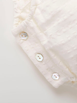 MAMELUCO CUELLO BORDADO BLANCO PURO