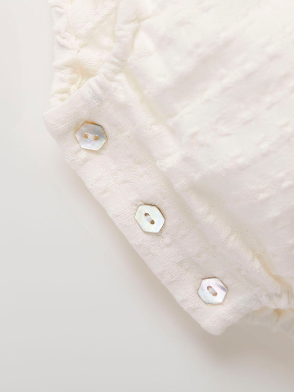 MAMELUCO CUELLO BORDADO BLANCO PURO