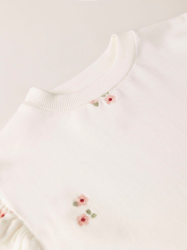 SWEATSHIRT WITH EMBROIDERED FLOWER RUFFLES AND BEIGE SLEEVES