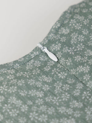 GREEN DAISY PRINT BOW JUMPSUIT