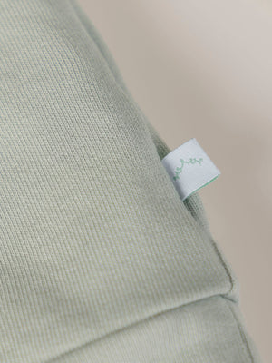 SWEATSHIRT WITH EMBROIDERED FLOWERS AND LIGHT GREEN CUFFS