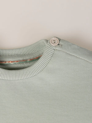 SWEATSHIRT WITH EMBROIDERED FLOWERS AND LIGHT GREEN CUFFS