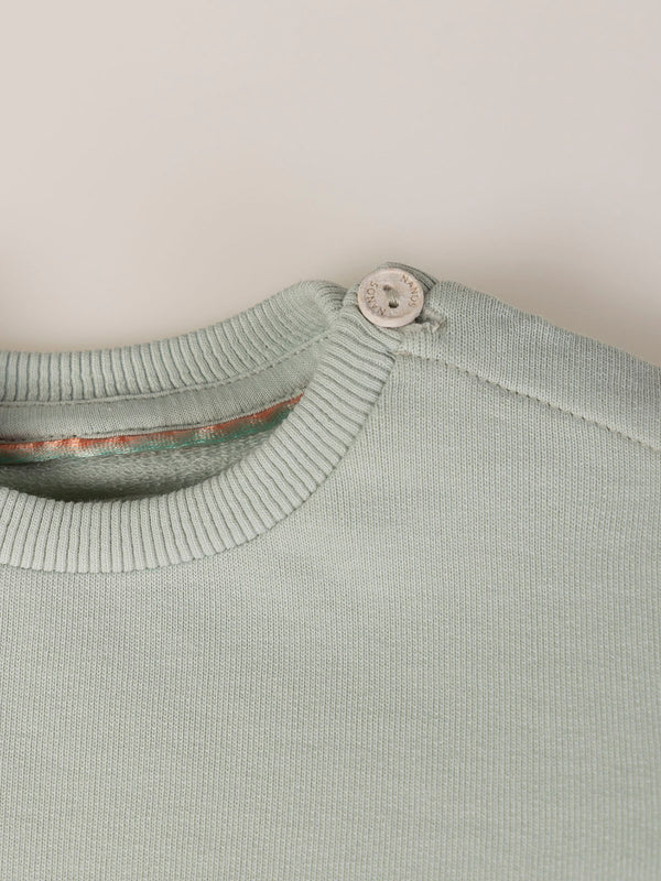 SWEATSHIRT WITH EMBROIDERED FLOWERS AND LIGHT GREEN CUFFS