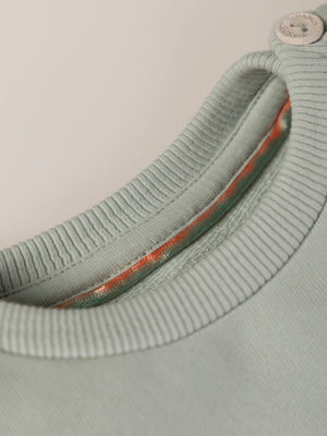 SWEATSHIRT WITH EMBROIDERED FLOWERS AND LIGHT GREEN CUFFS