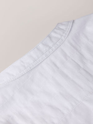 CAMISA ALGODÓN TEJIDO FANTASÍA CUELLO PANADERO NATA