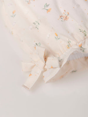 PRINTED PLUMETTI ROMPER WITH OFF-WHITE BOWS