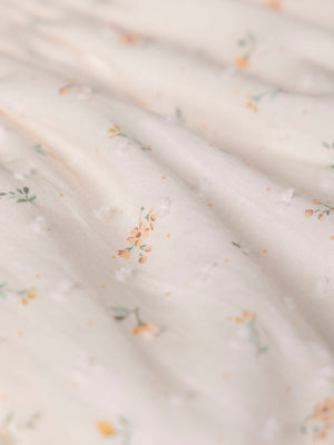 PRINTED PLUMETTI ROMPER WITH OFF-WHITE BOWS