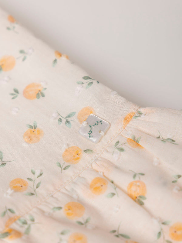 PEACH PRINT PLUMETIS DRESS WITH TWO PEACH RUFFLES