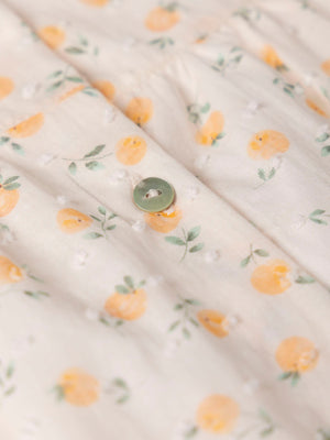 PEACH PRINT PLUMETIS DRESS WITH TWO PEACH RUFFLES