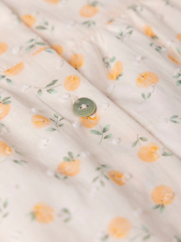 PEACH PRINT PLUMETIS DRESS WITH TWO PEACH RUFFLES