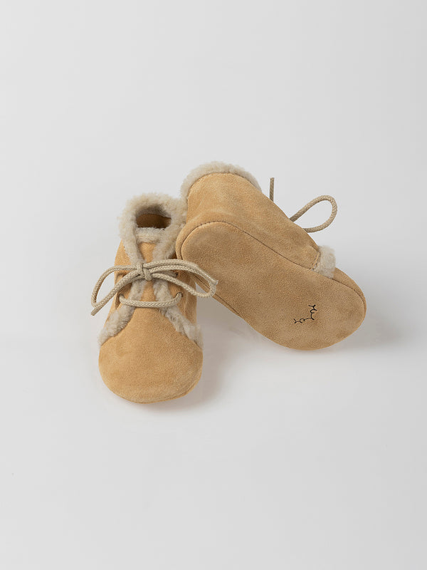 BADANA ANTE CORDONES DETALLE BORREGO BEIGE