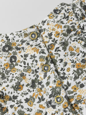 MINI CON BRAGUITA NIDO DE ABEJA ESTAMPADO FLORAL MULTICOLOR