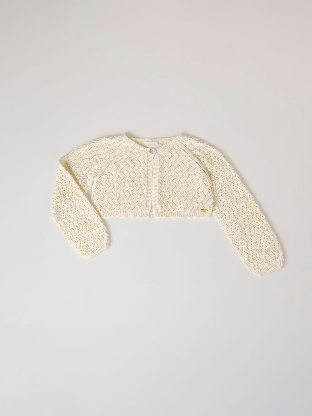 Chaqueta corta punto botón calados marfil