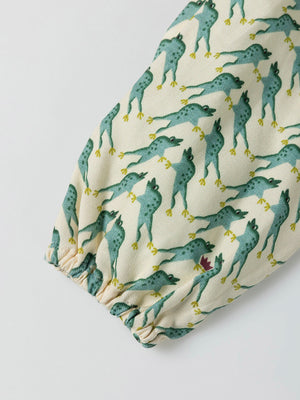 BLUSA VOLANTE CUELLO ESTAMPADO FROG CREMA