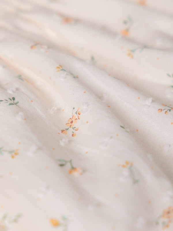 RANITA DE PLUMETTI ESTAMPADO Y LAZOS BLANCO ROTO