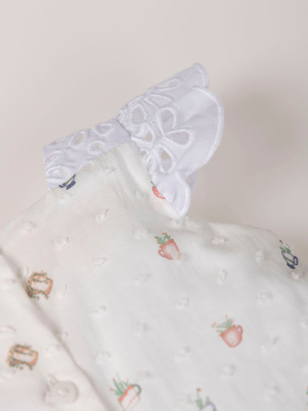 MINI CON BRAGUITA PLUMETI ESTAMPADO MACETA NATA