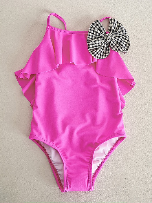 Bañador de niña rosa fucsia Nanos para ir a la moda a la playa